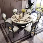 طاولة طعام دائرية مع كراسي بتصميم فاخر
